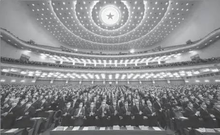  ?? DING LIN / XINHUA ?? The fourth session of the 13th National People’s Congress kicks off at the Great Hall of the People in Beijing on Friday.