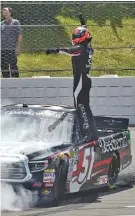  ?? THE ASSOCIATED PRESS ?? Kyle Busch celebrates after winning Saturday’s NASCAR Truck Series race in Long Pond, Pa.