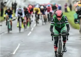  ??  ?? A sodden Dan rides through the Yorkshire rain at his eighth elite Worlds RR for Ireland