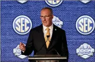  ?? BUTCH DILL — THE ASSOCIATED PRESS ?? SEC Commission­er Greg Sankey speaks to reporters during the NCAA college football Southeaste­rn Conference Media Days July 19.