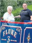  ?? ?? Fluke 3 at last: Sue Bond with boat painter Dave Bishop following the repainting and renaming of Fluke 3 in 2016.