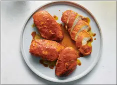  ?? DAVID MALOSH — THE NEW YORK TIMES ?? Sazón chicken breasts. Sazón makes an excellent marinade when combined with orange juice, garlic and olive oil, in this recipe from Von Diaz.