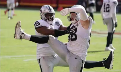  ?? Photograph: Kirby Lee/USA Today Sports ?? The Las Vegas Raiders celebrate a sack of Patrick Mahomes, who was harried all day.