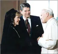  ?? AP FILE PHOTO ?? In this June 7, 1982, file photo, President Ronald Reagan and his wife, first lady Nancy Reagan, meet Pope John Paul II at the Vatican.
