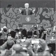  ?? The New York Times/DOUG MILLS ?? President Donald Trump speaks at the Asia-Pacific Economic Cooperatio­n conference Friday in Danang, Vietnam. He later said on the conference sidelines: “We are not going to let the United States be taken advantage of anymore.”