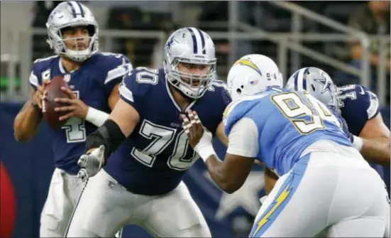  ?? ROGER STEINMAN — THE ASSOCIATED PRESS ?? The Cowboys improved offensive line has been a key to their recent surge.