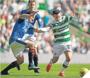  ??  ?? ■ Josh Windass tackles Celtic skipper Scott Brown.