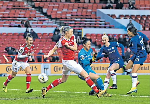  ??  ?? First strike: Bethany England scores Chelsea’s opening goal against Arsenal