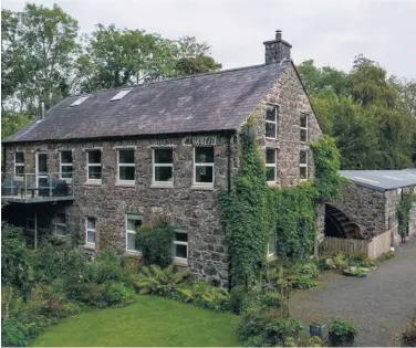  ??  ?? Whiggleton Mill in Kells, Ballymena; (right) the beautifull­y restored interior