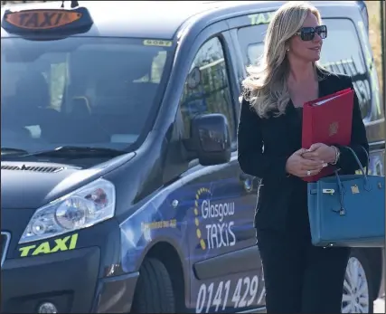  ??  ?? Business drive: Baroness Mone of Mayfair, as the bra tycoon now is, arriving at meeting in Glasgow