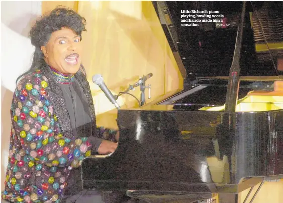  ?? Photo / AP ?? Little Richard’s piano playing, howling vocals and hairdo made him a sensation.