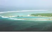  ?? STR/AFP/GETTY IMAGES ?? Woody Island in the South China Sea. China is pursuing
what it calls a “cabbage strategy,” surroundin­g islands in the region with as many ships as possible.
