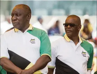  ??  ?? Above: President Cyril Ramaphosa and the suspended ANC secretary general
Ace Magashule (R) together at an ANC event in 2019.