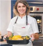  ?? ?? Former MasterChef contestant and Coles ambassador Courtney Roulston uses KitchenAid bakeware for her Sunday roasts.