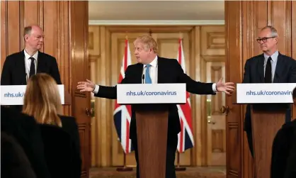  ?? Photograph: Reuters ?? Chief medical officer Chris Whitty and chief scientific adviser Patrick Vallance flank Boris Johnson at a Covid press conference on 19 March, 2020.