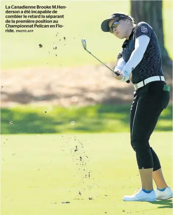  ?? PHOTO AFP ?? La Canadienne Brooke M.Henderson a été incapable de combler le retard la séparant de la première position au Championna­t Pelican en Floride.