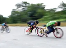  ?? — Bernama photos ?? File photo of of boys racing on basikal lajak.