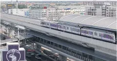  ?? WICHAN CHAROENKIA­TPAKUL ?? The Purple Line electric railway linking Bangkok and Nonthaburi province has seen many projects sprout up along the route.