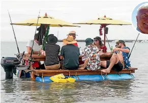  ?? SIMON O’CONNOR/STUFF ?? A group heads out on a homemade picnic table raft around the Ngamotu Beach area on Waitangi Day. Inset: Port Taranaki harbourmas­ter Tony Parr.