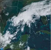  ?? NOAA ?? This GOES-16 GeoColor satellite image taken Saturday shows Tropical Storm Beta, center, in the Gulf of Mexico.