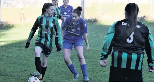  ?? Pic: EVENTPHOTO­WALES ?? Bethesda’s Chloe Hughes shields the ball from Amlwch defender Chloe Taylor during last weekend’s North Wales League Division Two clash at Parc Meurig