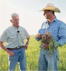  ?? ?? Loy and Adam Sneary talk about grazing practices that capture carbon in the soil of their ranch in Matagorda County.