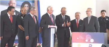  ??  ?? Najib (fourth left) launches the 1Malaysia Civil Servants Housing Scheme. Also seen are Ahmad Zahid (third left), Chief Secretary to the Government Tan Sri Dr Ali Hamsa (fifth left) and Deputy Home Minister Datuk Masir Kujat (sixth left). — Bernama photo