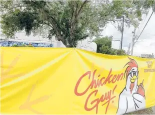  ?? AUSTIN FULLER/ORLANDO SENTINEL ?? A banner outside 818 S. Orlando Ave. in Winter Park featuring the Chicken Guy logo informs customers the restaurant will be “hatching soon.”
