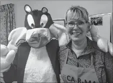  ?? BRENDAN AHERN/THE NEWS ?? Helen Baudoux with Sylvester at the CARMA luncheon at the New Horizons Clubhouse in the Town of Pictou.