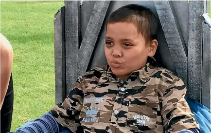  ?? PHOTO: MARTY SHARPE/STUFF ?? Kingston Karangaroa-Mohi, 8, at a rugby match put on for him yesterday at Tamatea Park, Napier, as part of his wish list.