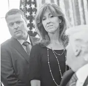  ?? Andrew Harrer / Bloomberg ?? President Donald Trump praises Southwest pilot Tammie Jo Shults on Tuesday at the White House.