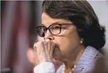  ?? Andrew Harrer / Bloomberg ?? Sen. Dianne Feinstein asked Comey why he didn’t confront President Trump and tell him, “This is wrong.”