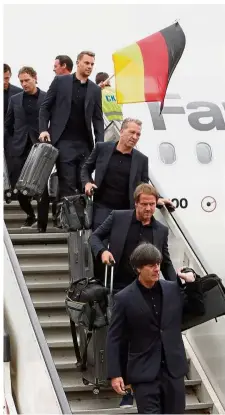  ?? — Reuters ?? We’re here: The Germany team arriving in Moscow yesterday.