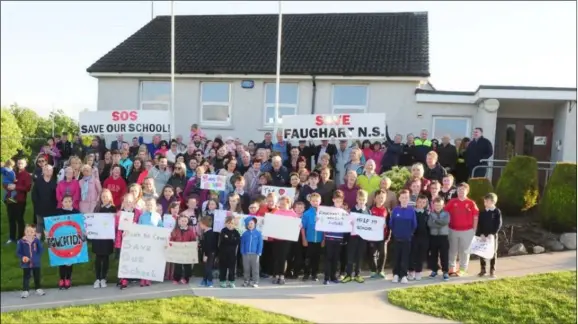  ??  ?? A large group of parents and pupils at the Save Our School campaign at Scoil Naisiunta Bhrighde in Faughart.