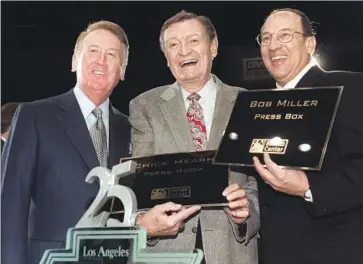  ?? Lawrence K. Ho Los Angeles Times ?? VIN SCULLY, CHICK HEARN AND BOB MILLER had celebrated broadcasti­ng careers as the Los Angeles voices of the Dodgers, Lakers and Kings. Miller, 83, says Scully could have also called hockey games.