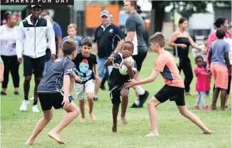  ??  ?? SHARKS FUN DAY THE public was invited to a Cell C Sharks fun day on the Kings Park outer fields in Durban yesterday, where fans had the opportunit­y to challenge their favourite players to a round of touch rugby.