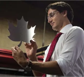  ?? ADRIAN WYLD/THE CANADIAN PRESS ?? Prime Minister Justin Trudeau has stuck by his election promise to end Canada’s combat mission in Iraq and Syria.