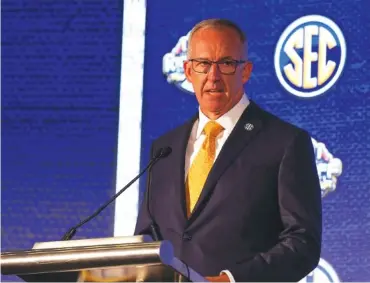  ?? SEC PHOTO BY JIMMIE MITCHELL ?? Southeaste­rn Conference commission­er Greg Sankey speaks Monday afternoon as the SEC Media Days opened at the Wynfrey Hotel in Hoover, Alabama.