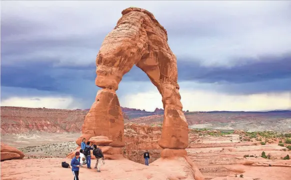  ?? NICK KONTIS/SPECIAL TO USA TODAY ?? One of the most recognizab­le and well-photograph­ed natural areas in the country, Arches National Park encompasse­s just over 100 square miles of eastern Utah and boasts more than 2,000 natural sandstone arches. Its star-studded attraction is the 52-foot-tall monolith Delicate Arch.