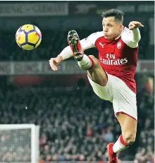  ?? - AFP photo ?? (FILES) This file photo taken on December 22, 2017 shows Arsenal’s Chilean striker Alexis Sanchez controling the ball during the English Premier League football match between Arsenal and Liverpool at the Emirates Stadium in London. Arsenal’s Alexis...