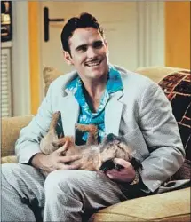  ?? Glenn Watson 20th Century Fox ?? SLAMMER the dog, shown with Matt Dillon, gave as good as he got in his role as Puffy, companion to an extremely tan neighbor.