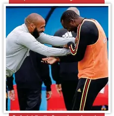  ?? REUTERS ?? Perfect strike: the France legend goes in on the Belgium striker