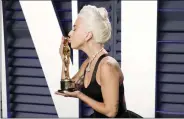  ??  ?? Lady Gaga with an Oscar for “Shallow”.