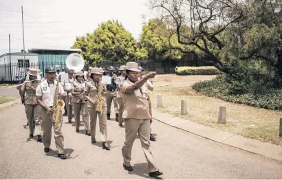  ?? Pictures: Jacques Nelles ?? MARCHING ORDERS. Members of the Tshwane Metro Police Band parade during the department of community safety’s operationa­l festive season launch yesterday at the Centurion licensing department in Pretoria.