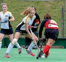  ?? PHOTO: MONIQUE FORD/STUFF ?? Eastern Hutt’s Kat O’Callaghan attempts to dribble past Harbour City’s Ruby Logan on Saturday.