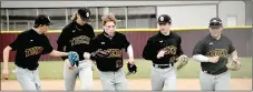  ?? MARK HUMPHREY ENTERPRISE-LEADER ?? Prairie Grove baseball players (from left): Tate Benoit, Casey Shipley, Conner Hubbs, Jaxon Beare and Jackson Sorters come off the field during a March 12 game at Lincoln won by the Tigers, 12-2. Shipley, Hubbs, Beare and Sorters were named All-Conference along with Sloan Smith for the
2021 season.