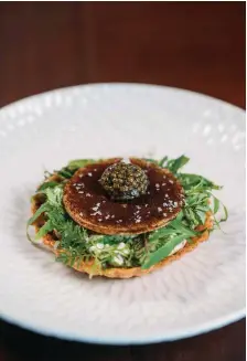  ?? ?? This page:
Fabio Nompleggio’s signature langoustin­e tart with Nespresso India- and Brazilinfu­sed caviar
Opposite page: A sampling of Chaat’s new lunch menu