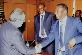  ?? Picture: John Manzongo ?? President Emmerson Mnangagwa congratula­tes Karo Investment­s’s Mr Loucas Pourolis after the signing of a historic $4,2 billion investment deal in Harare last week.—