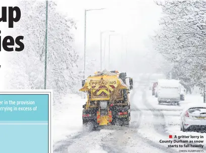  ?? OWEN HUMPHREYS ?? A gritter lorry in County Durham as snow starts to fall heavily