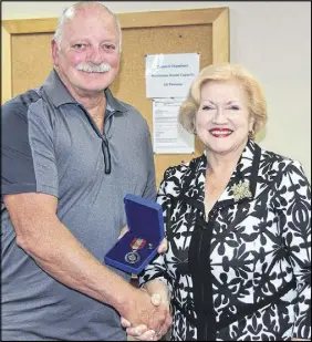 ?? HARRY suLLIVAN – tRuRO DAILY NEWs ?? Valley resident Gerry Tucker is seen being presented with the Governor General’s Sovereign’s Medal for Volunteers from Colchester County Mayor Christine Blair.